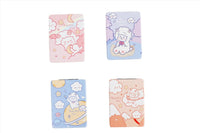 Four sheep compact mirrors with pastel patterned covers in pink, lavender, and blue