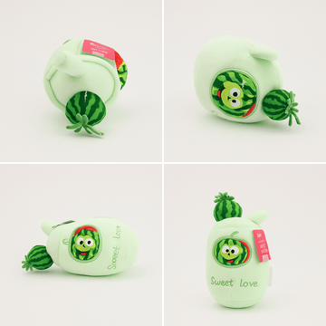 Light green watermelon plush toy with cartoon face patch and green striped stem