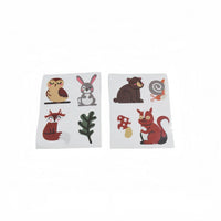 Animal sticker sheets with rabbit, bear, fox, squirrel, mushrooms, and cactus designs
