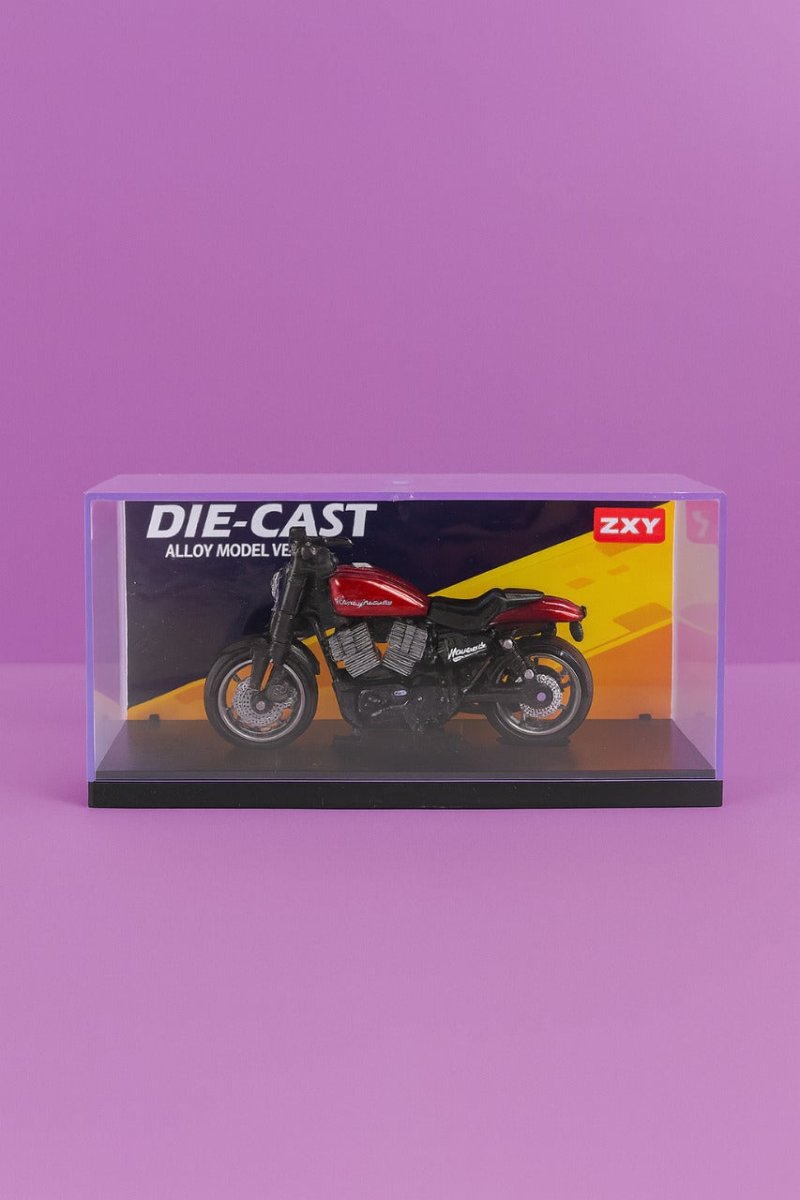 Die-cast motorcycle model in clear display box, black and yellow, side view