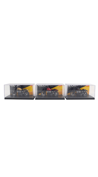 Set of die-cast motorcycle models in small display boxes, three angled views