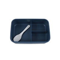 Kids lunch box with inner tray and white spoon; dark blue lid open