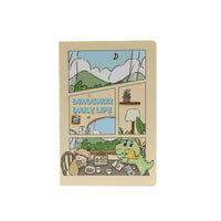 A5 dinosaur cartoon stitched notebook, front view with multi-panel dinosaur life artwork