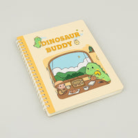 Spiral notebook with beige dinosaur buddy illustrated cover and cartoon dashboard scene
