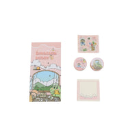 Pink dinosaur notebook set pieces: notebook, sticker circles, and small note cards