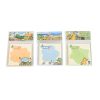 Square memo pads with 'Dinosaur Buddy' designs, three covers shown side by side