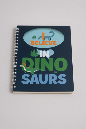 B5 spiral notebook with navy cover, dinosaur graphic, and “BELIEVE IN DINO SAURS” text