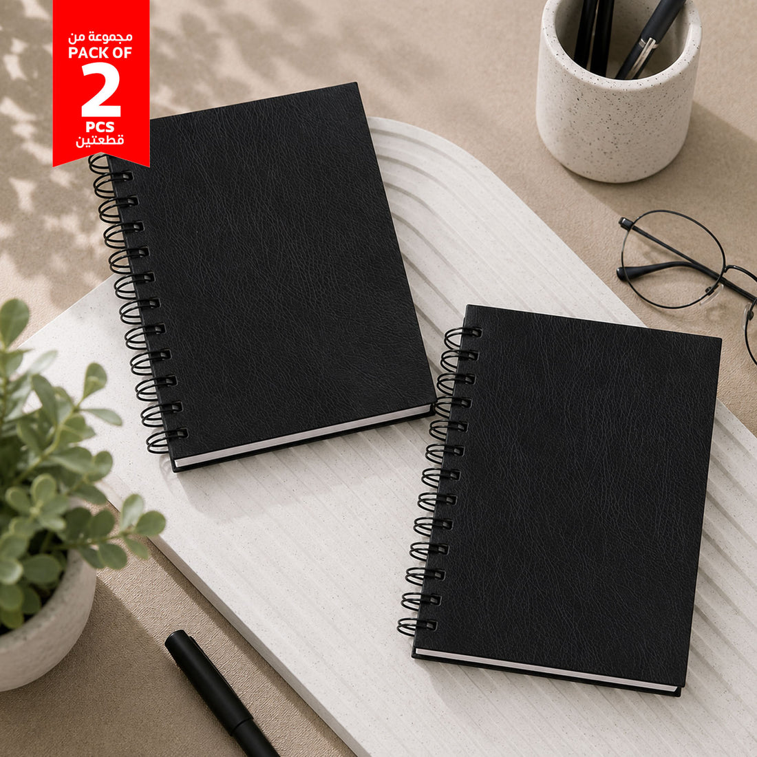 Set of 2 small black spiral notebooks with minimalist textured covers
