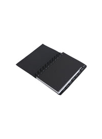 Black spiral address notebook with angled cover and notebook edge