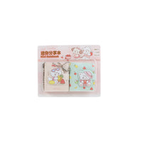 Mini notebook set with keychain charm and two pastel notebook covers, bear and bunny art