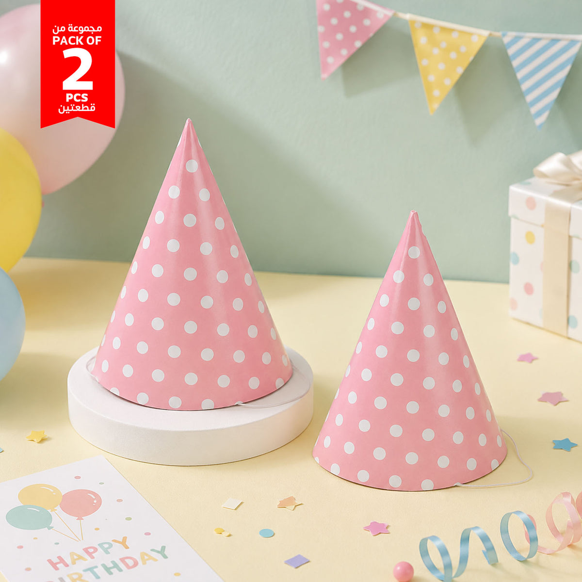 Pink polka dot party hats (2-pack): two cone hats with elastic chin strings