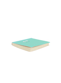 Green emoticon mini notepad with sad face cover and light beige spine