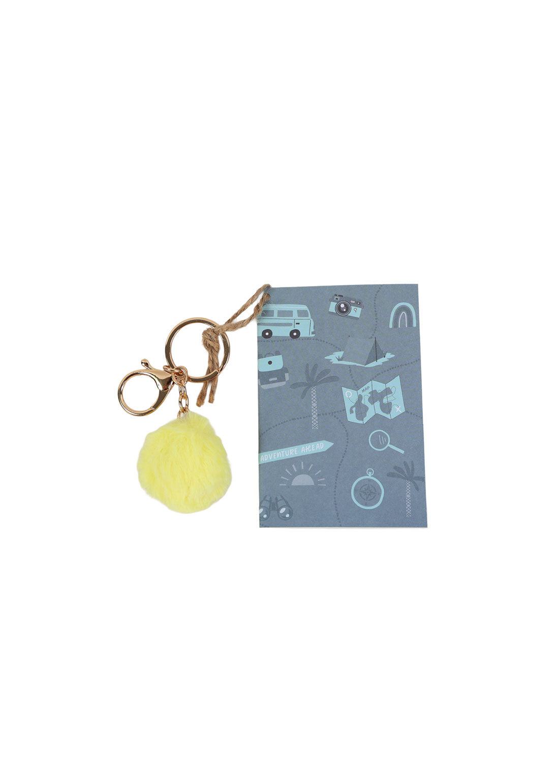 Blue mini notebook with yellow pom pom keychain and travel icon patterned cover