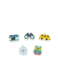 Assorted travel-themed erasers with camera, goggles, yellow bus, backpack, and compass shapes