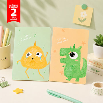 Set of 2 kids notebooks with colorful monster animal covers, one mint one peach