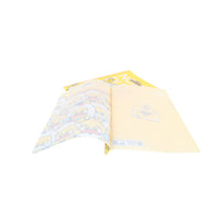 Two yellow duck scientist notebooks partially open, illustrated pages and back panel.