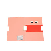 Cartoon face notebook back cover with pink and red design and barcode label