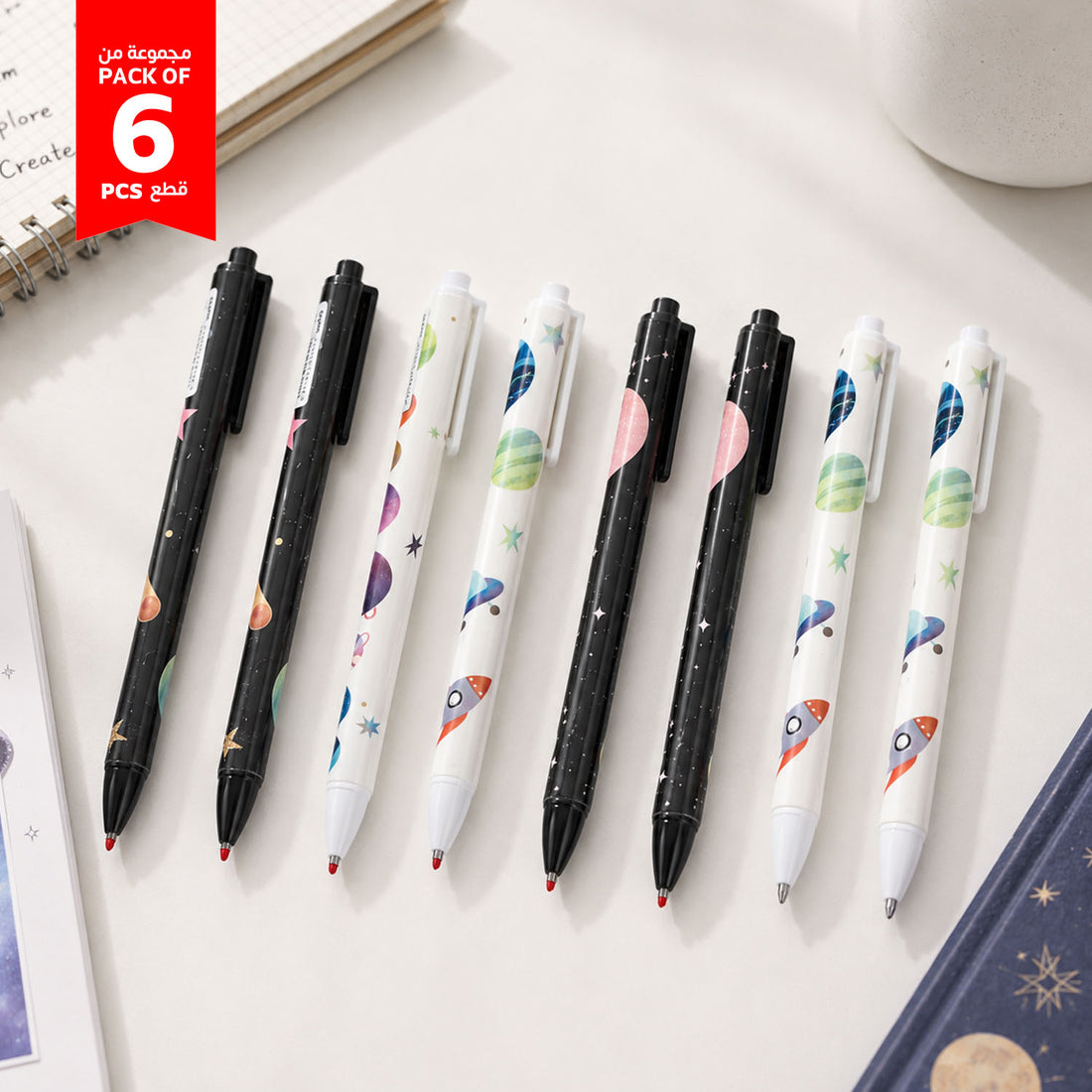 Pack of 6 click gel pens with space prints—black and white barrels, mixed colors