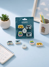 Travel-themed eraser blister pack with small shaped pieces in bus, camera, compass designs