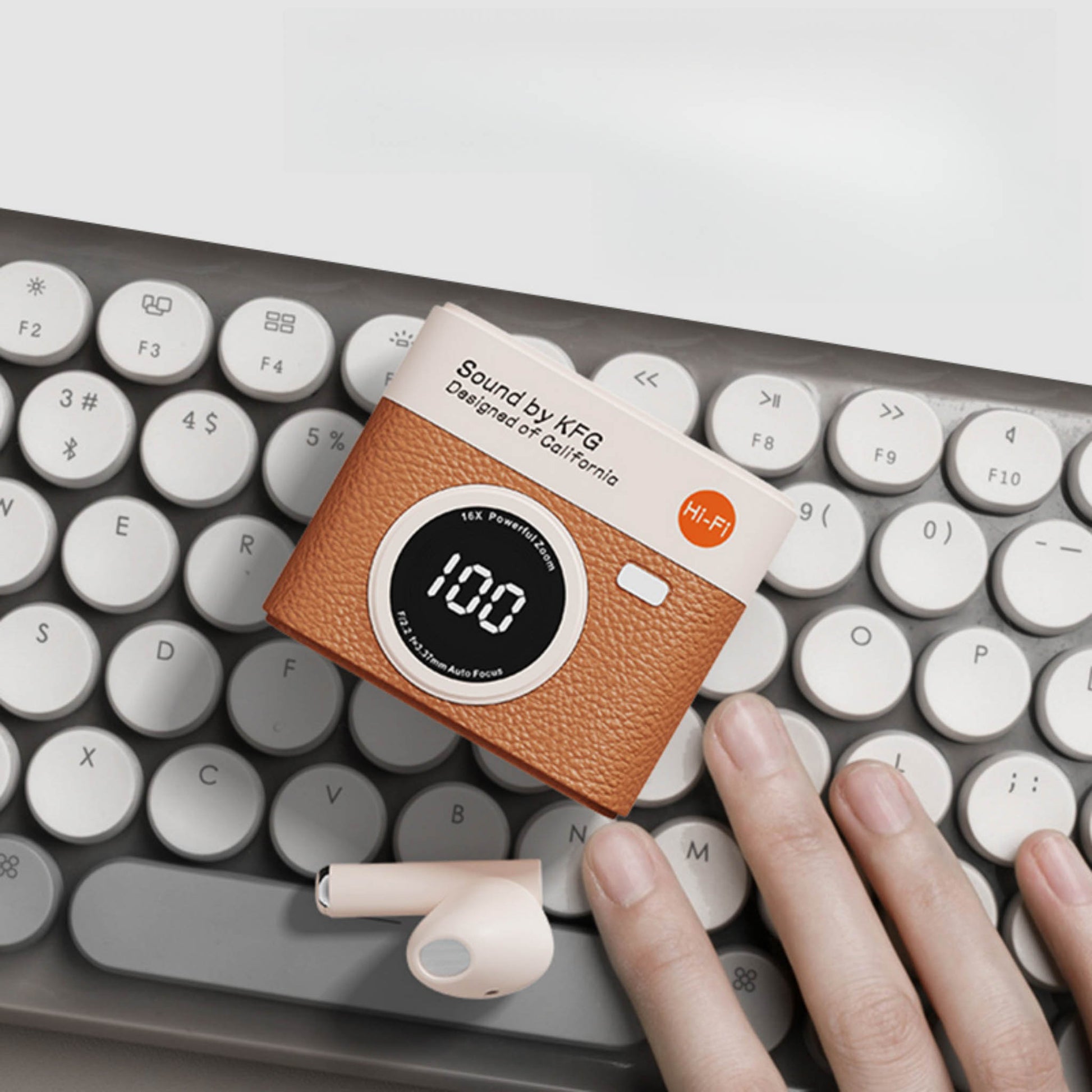 Wireless earbuds charging case with brown textured finish, digital display, and white earbuds