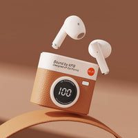 Wireless earbuds charging case with tan textured finish, digital display, and white earbuds