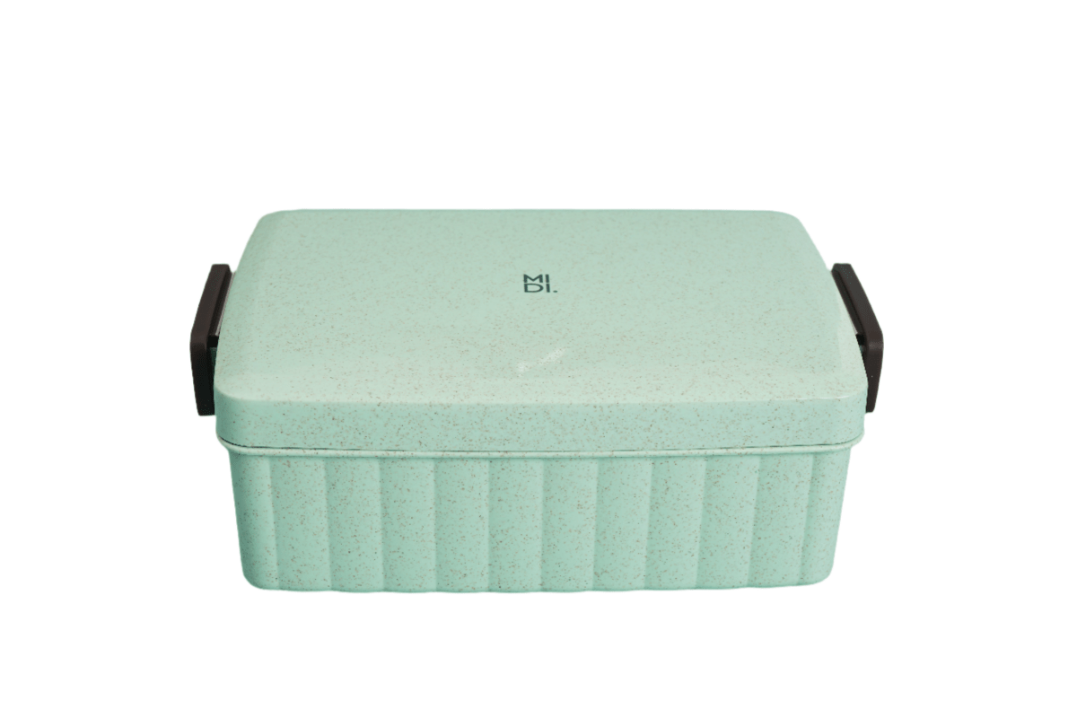 Eco-friendly lunchbox in mint with ridged sides and black handle tabs