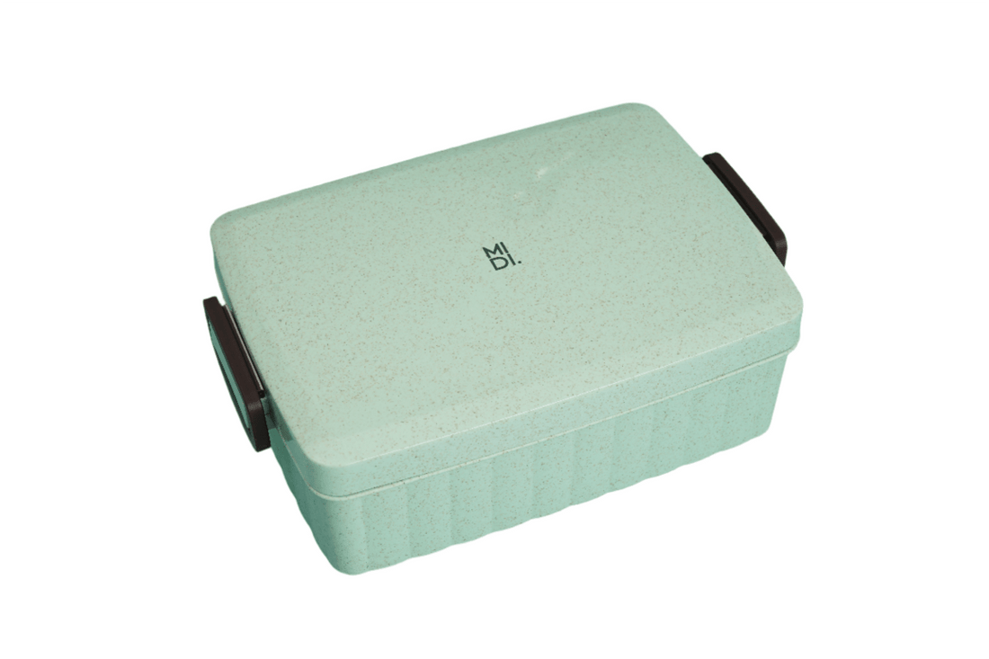 Eco-friendly lunchbox in mint with black side handle and top lid
