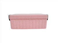 Eco-friendly lunchbox in pink with ridged sides and black handle tabs