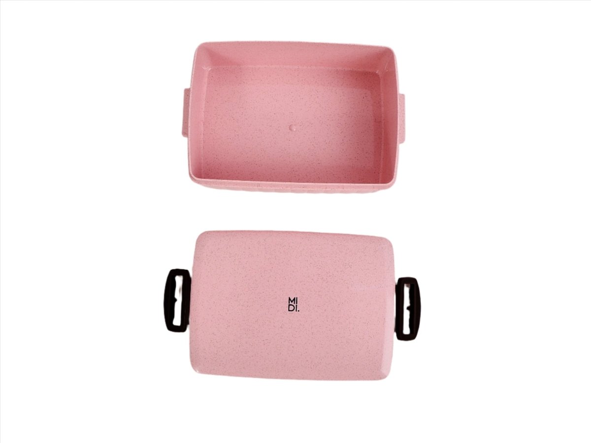 Eco-friendly lunchbox in pink, lid and base shown with black side handles