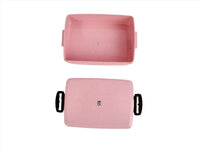 Eco-friendly lunchbox in pink, lid and base shown with black side handles