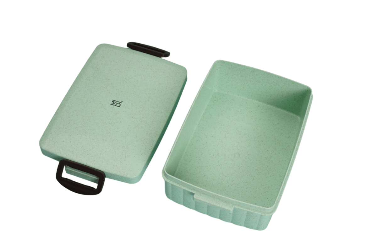 Eco-friendly lunchbox in mint, lid and base shown with black handle