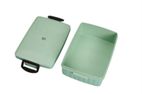 Eco-friendly lunchbox in mint, lid and base shown with black handle