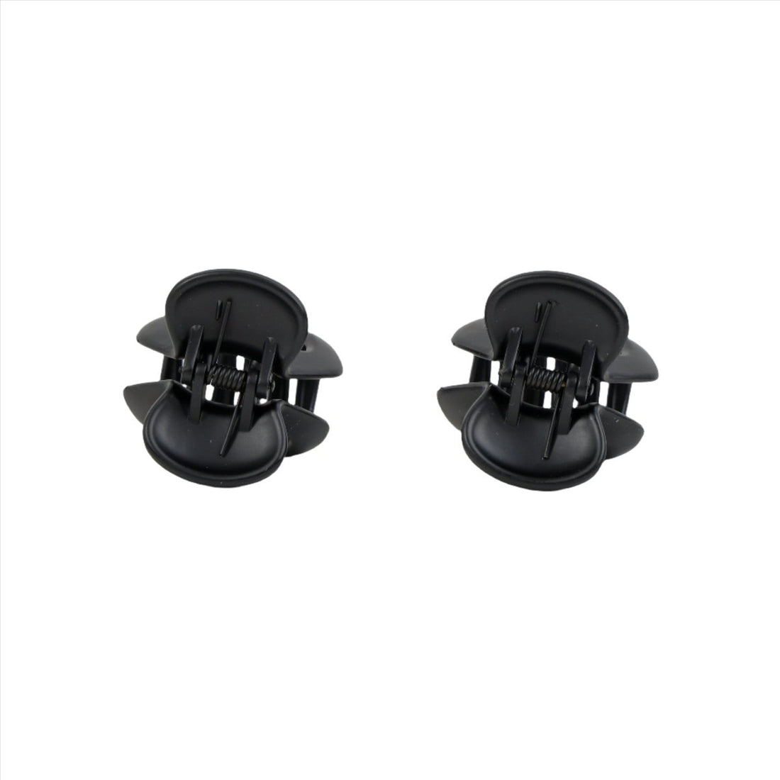 Adult claw clip, dark, side view with spring teeth and grip pads.