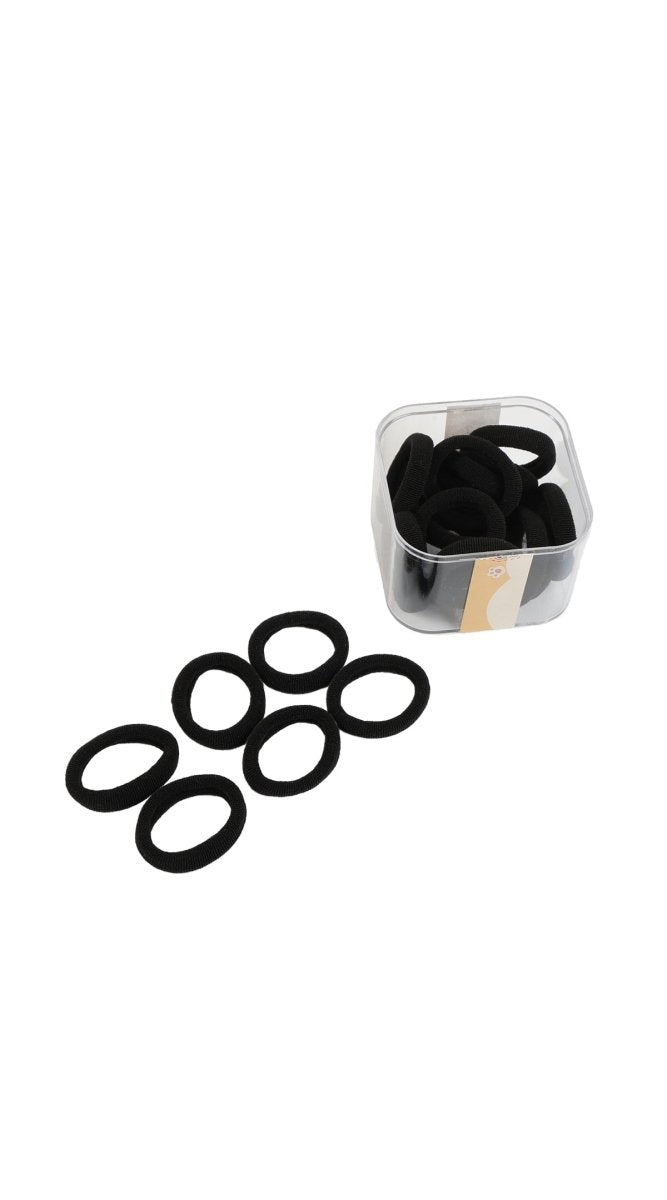Square clear box with black towel rings and loose rings on a white surface