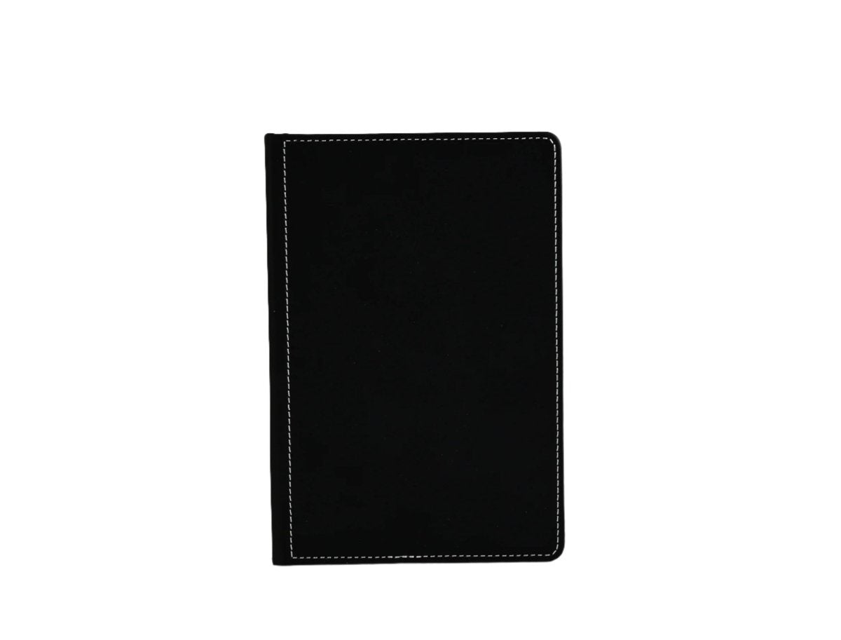Black notebook cover with contrast stitching, front