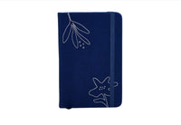 Navy botanical notebook with blue fabric cover, line drawings, and fabric spine