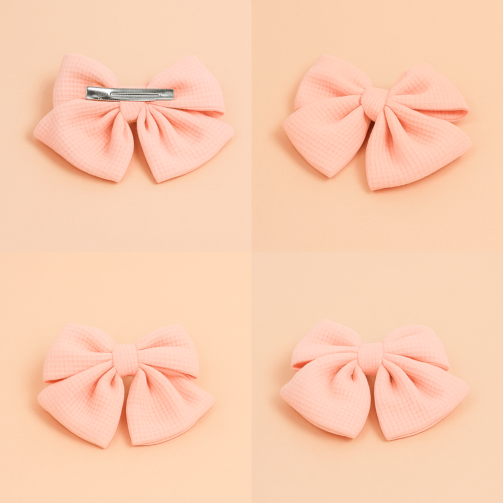 Pink fabric bow with center knot and alligator hair clip, folded double-loop design