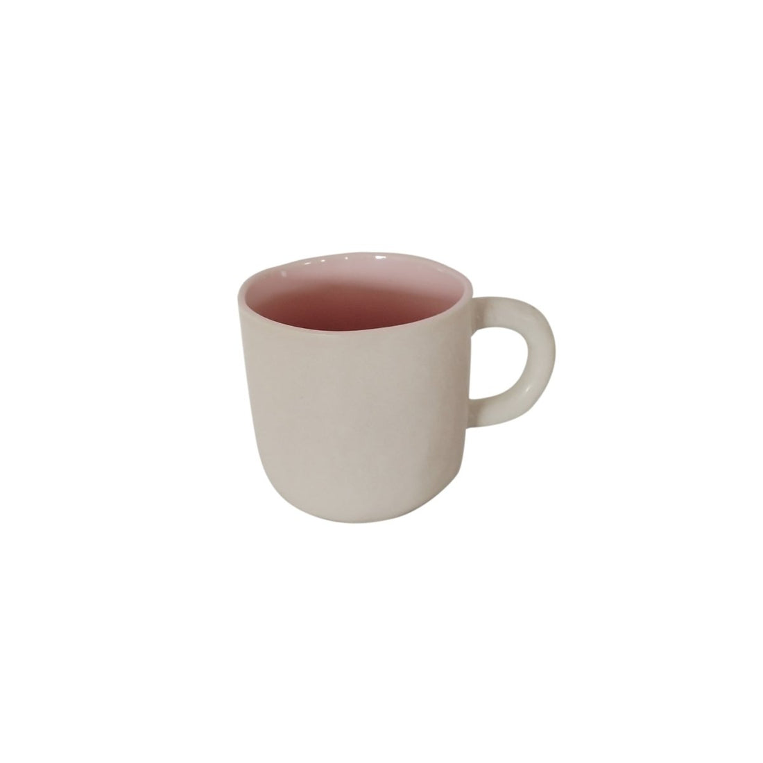 Ceramic cup with cream exterior and dark pink interior, rounded handle
