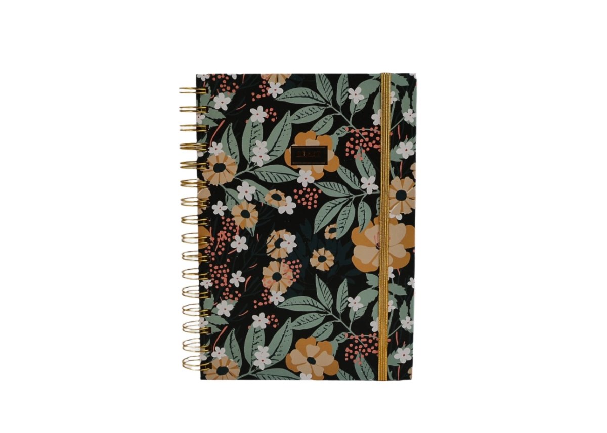 Hardcover spiral notebook, floral cover with gold ring binding, straight-on view.