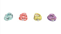 Kids hair ties and bracelets set with mint, coral, yellow, and purple braided designs
