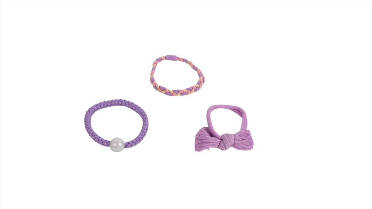 Purple braided hair ties and bracelets with bow and bead details