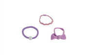 Purple braided hair ties and bracelets with bow and bead details