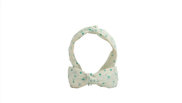 Polka dot bow headband with mint dots on light fabric band
