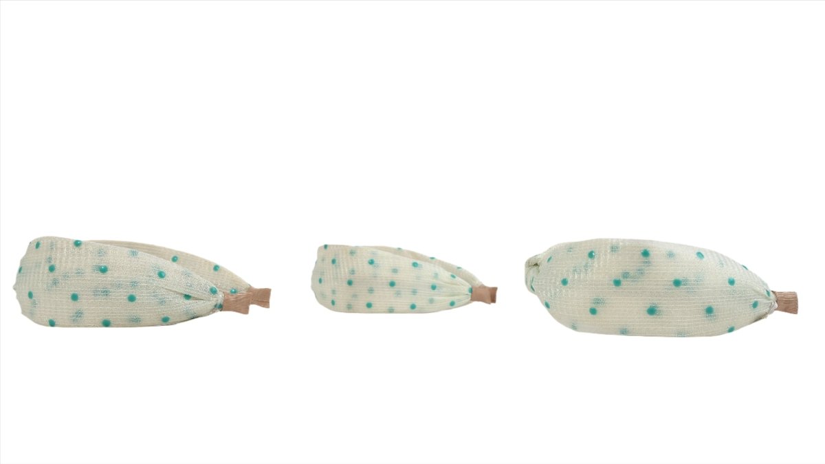 Polka dot bow headband with pointed ends, mint dots on light fabric
