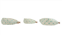 Polka dot bow headband with pointed ends, mint dots on light fabric