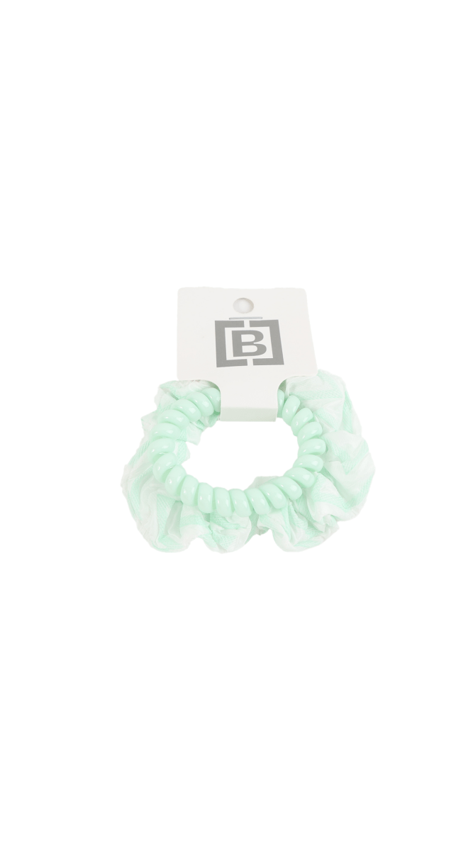 Mint green scrunchie-style hair tie with ruffled texture and tag