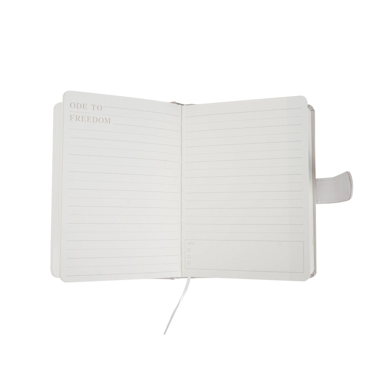 Pastel paper notebook opened flat, lined pages and magnetic buckle closure