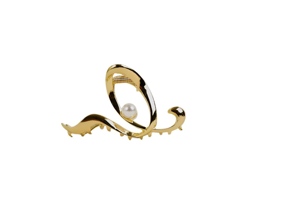 Gold hair clip with pearl-inlaid curved leaf design