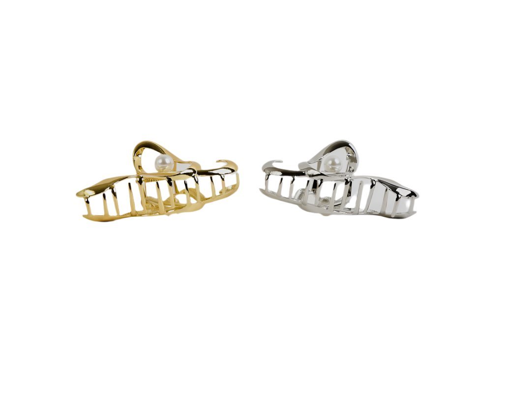 Gold and silver hair clips with pearl accents and comb-like teeth detail