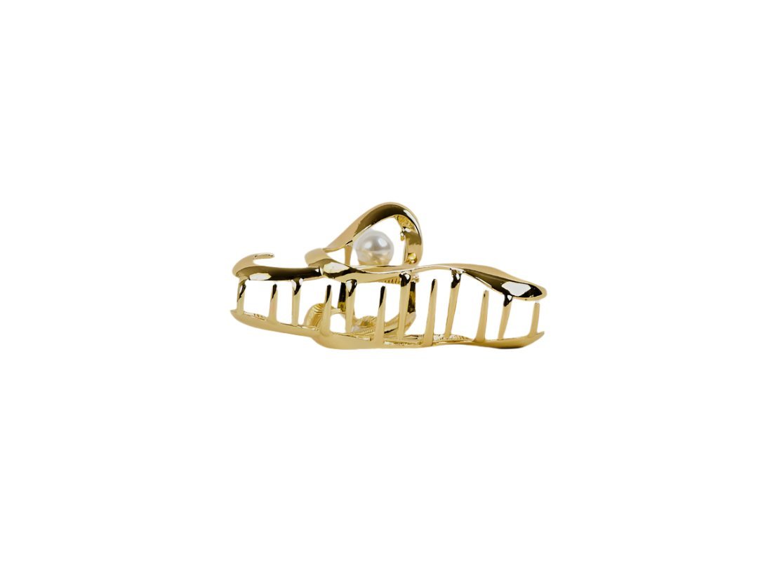 Gold hair clip with pearl centerpiece and vertical cutout teeth detail
